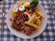 pork chop salad and chips - pool bar Vrissiana Beach Hotel