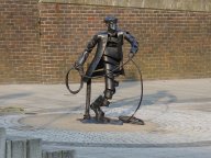 boatman casting his rope on the Town Wharf